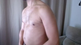 Latin man smoking tina and stroking his uncut dick