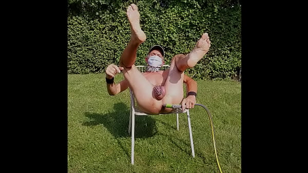 naked slave exposed in penis cage got enema and fucks himself with dildo, cucumber, banana BDSM