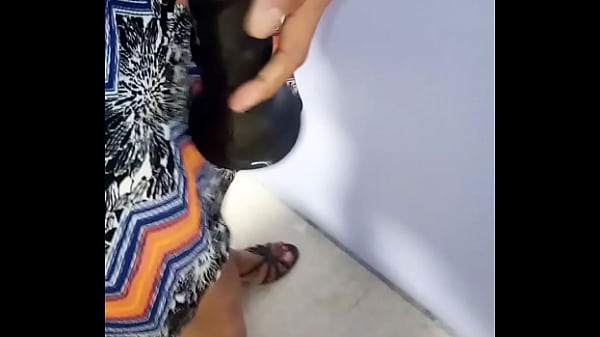 Hot Latina shemale in dress and heels plays with huge dildo