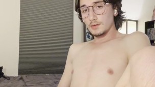 Glasses-Wearing Twink Sucks Cock on Bedroom Floor